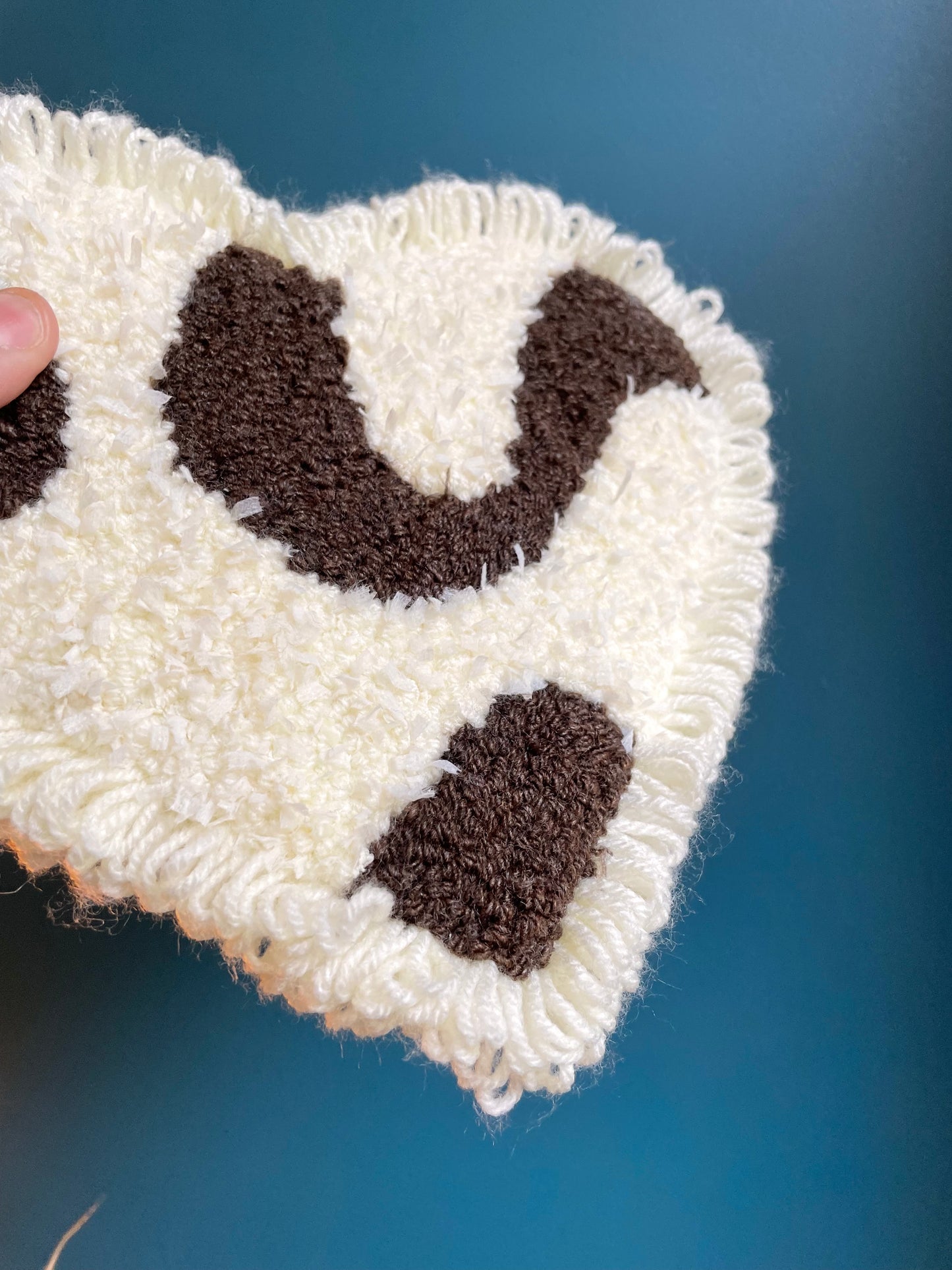 Petit cœur bouclé vache